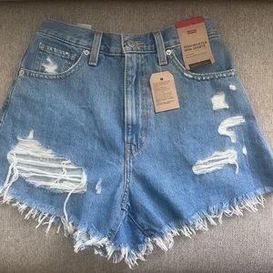 High-waisted mom shorts. A high relaxed through the hip.